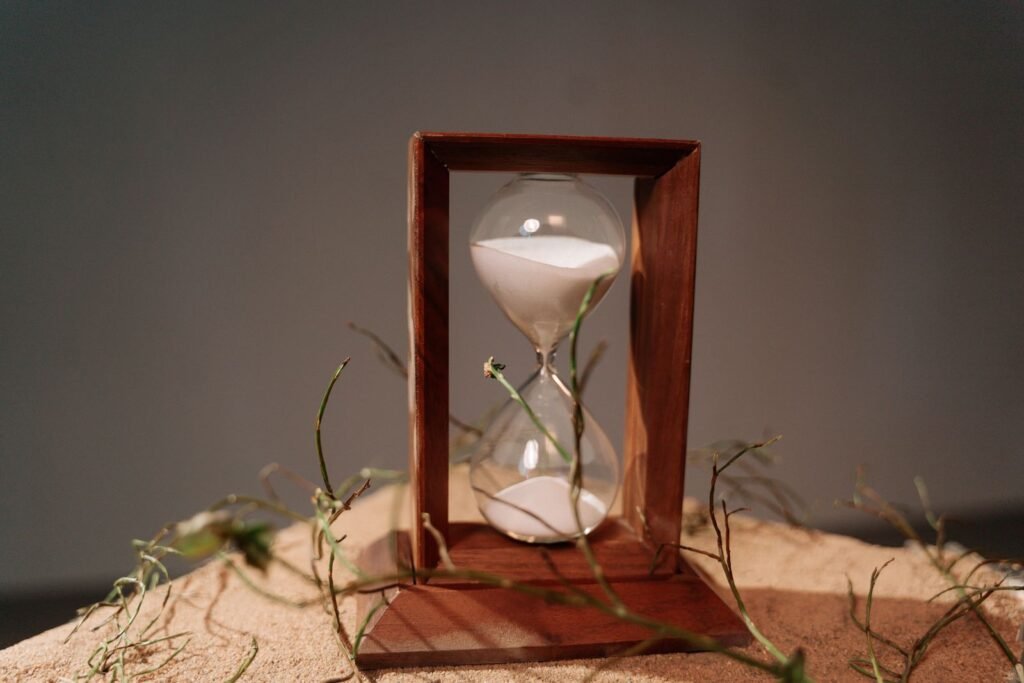 Wooden hourglass with white sand, a simple way to time a steam room session