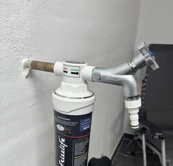 Water filter on the tap in our basement sauna room, used for drinking water and loyly water
